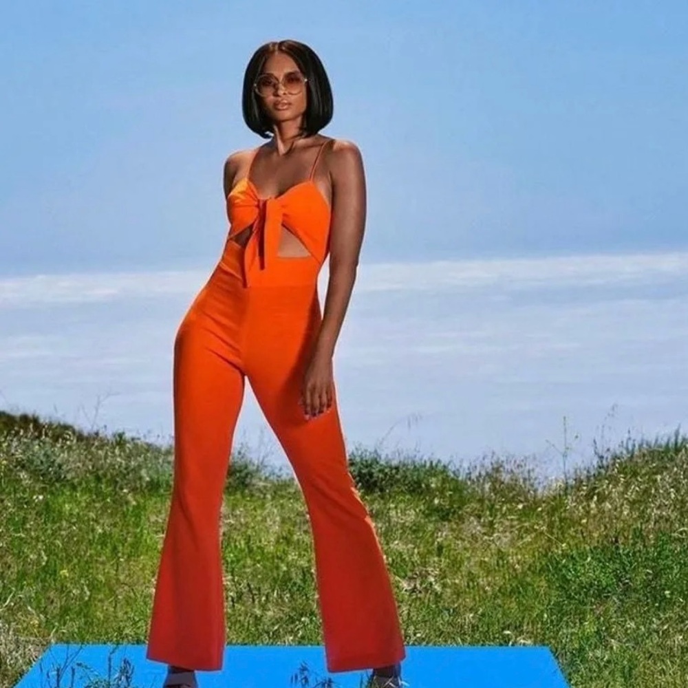 Orange Cut-Out NWT Wide-Leg Jumpsuit with side zipper in a Viscose/Spandex blend